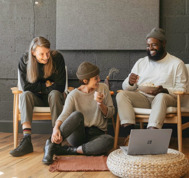 The Hubit team relaxing together in the studio